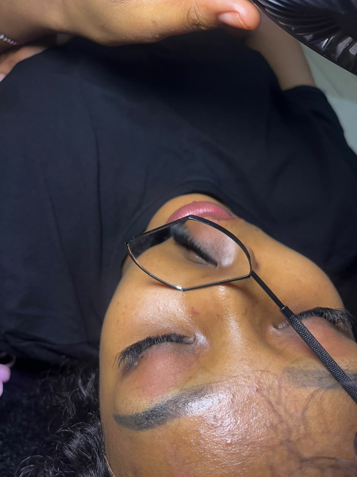 Client with fresh lash extensions